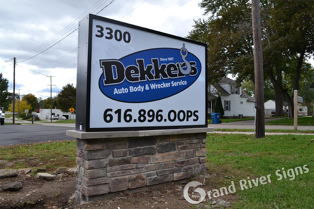 Dekkers Auto LED Cabinet Monument Sign with Custom Stone Base – Grand Rapids MI